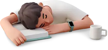 A man sleeping on a book with his head on the table.